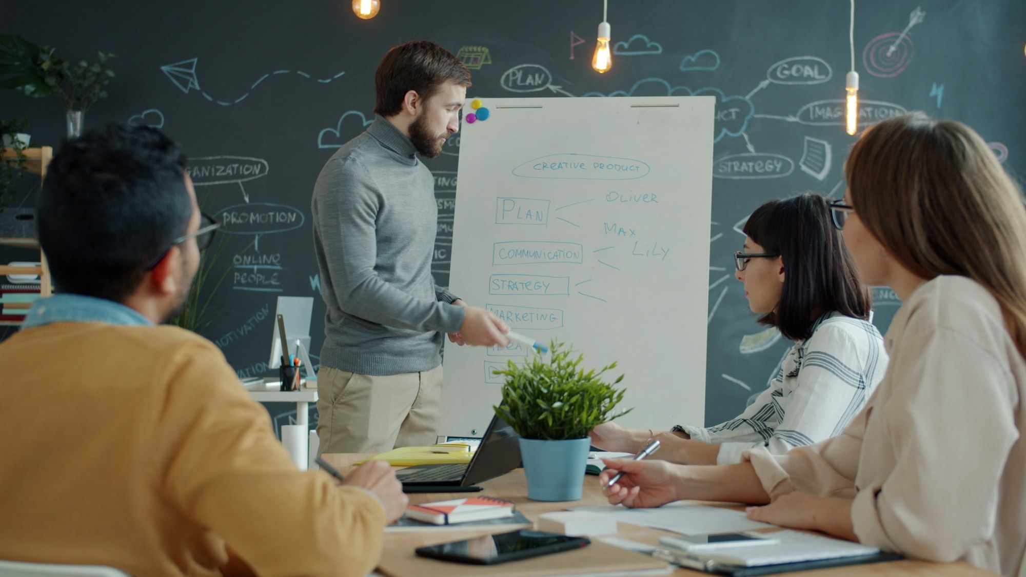 A hiring manager reviewing candidate materials with a colleague